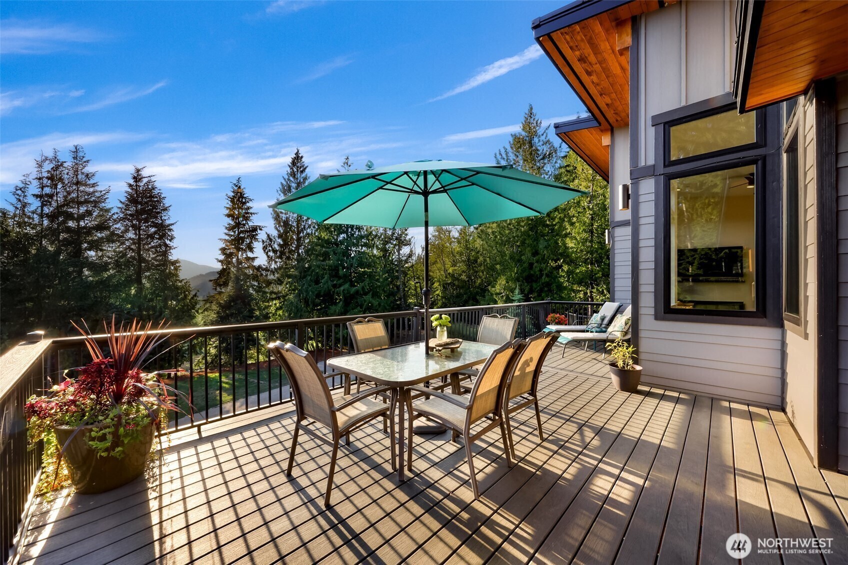 322 Manley Road Bellingham, WA 98229 - Photo 8 of 40 a view of a patio with a table and chairs