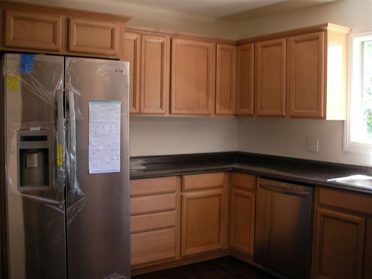81 Valley Road Oak View, CA 93022 - Photo 6 of 11 a kitchen with a refrigerator and cabinets