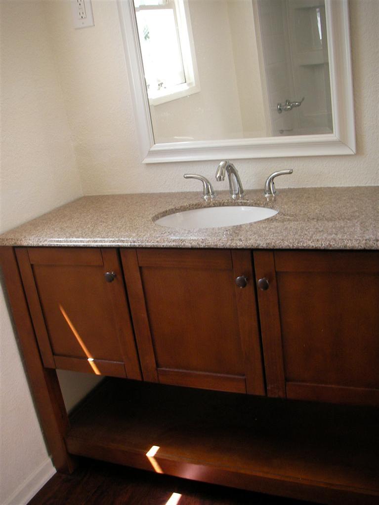 81 Valley Road Oak View, CA 93022 - Photo 8 of 11 a bathroom with a sink and a mirror