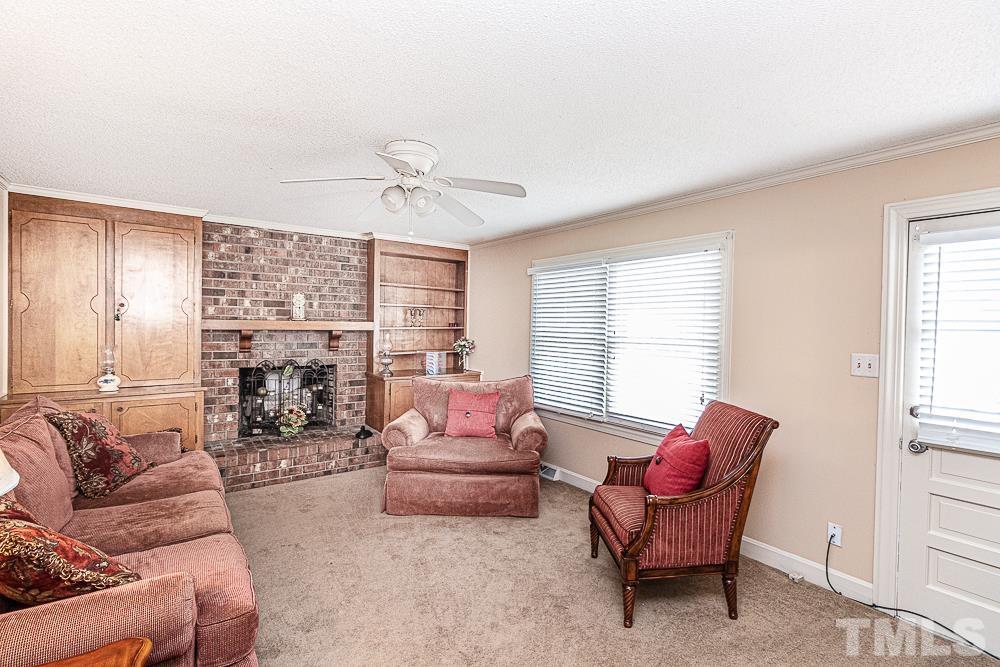 2612 Amherst Road Rocky Mount, NC 27804 - Photo 3 of 17 Cozy gas log fireplace and custom built ins!