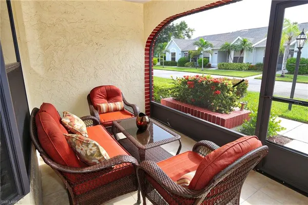 a view of a chairs in a balcony