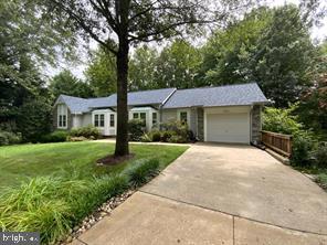 5625 Gunner Run Road Churchton, MD 20733 - Photo 1 of 4 a front view of a house with a yard