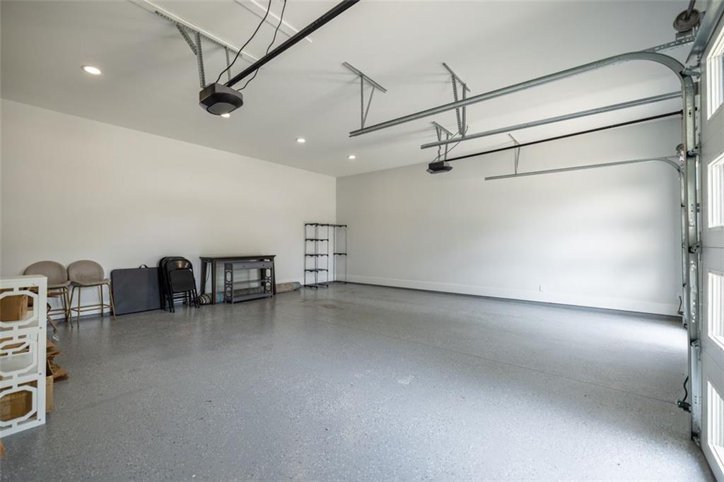 3470 Hamilton Mill Road Buford, GA 30519 - Photo 38 of 39 a view of a livingroom with furniture and a ceiling fan