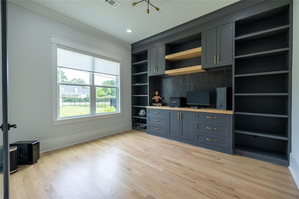 3470 Hamilton Mill Road Buford, GA 30519 - Photo 7 of 39 a room with a cabinets and a window