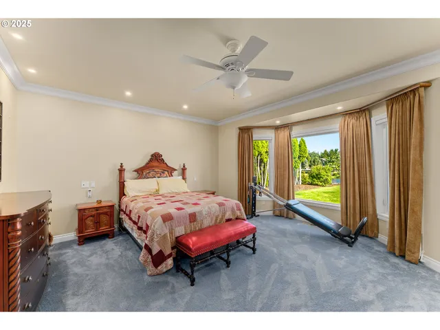 a bathroom with a glass door shower and a sink