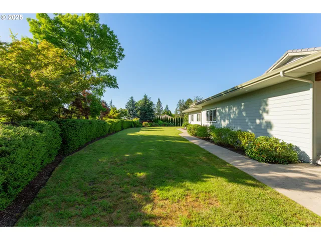 a spacious bedroom with a bed and a window