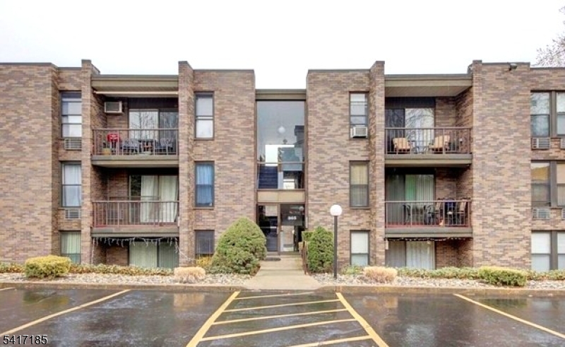 a view of a building with a street
