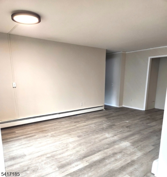 365 River Road, Unit E Nutley, NJ 07110 - Photo 2 of 14 a view of an empty room and window