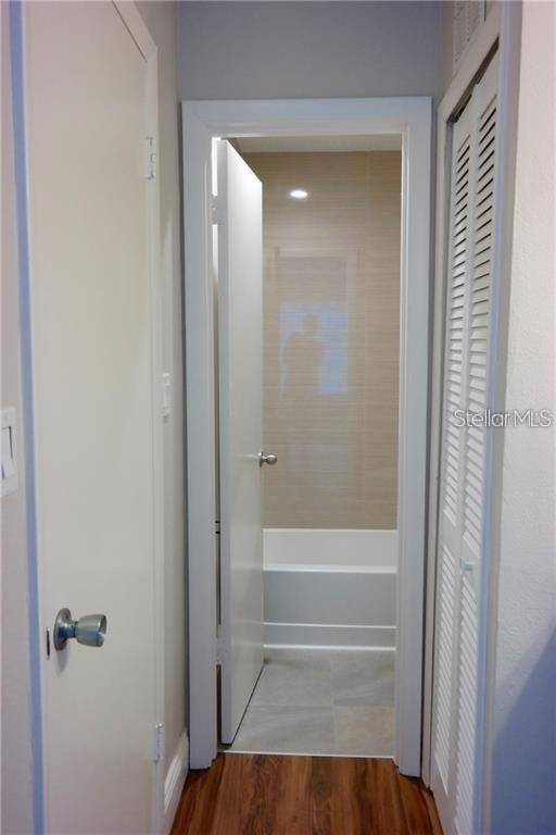 224 Afton Square, Unit 104 Altamonte Springs, FL 32714 - Photo 10 of 13 a bathroom with a shower