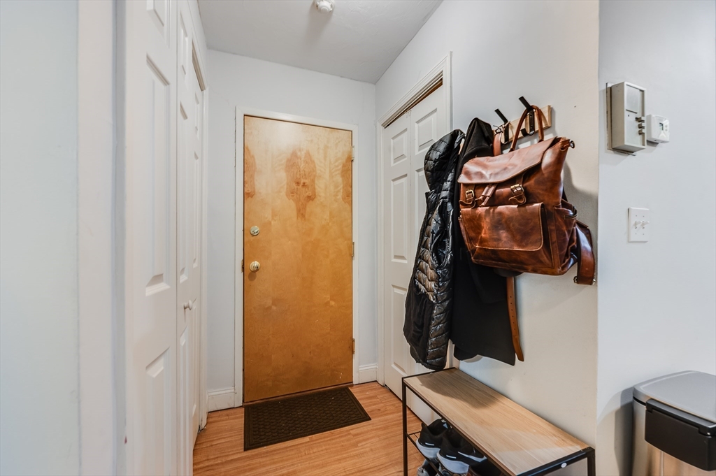 21 Aberdeen Street, Unit B Boston, MA 02215 - Photo 10 of 13 a view of walk in closet with clothes and shoes