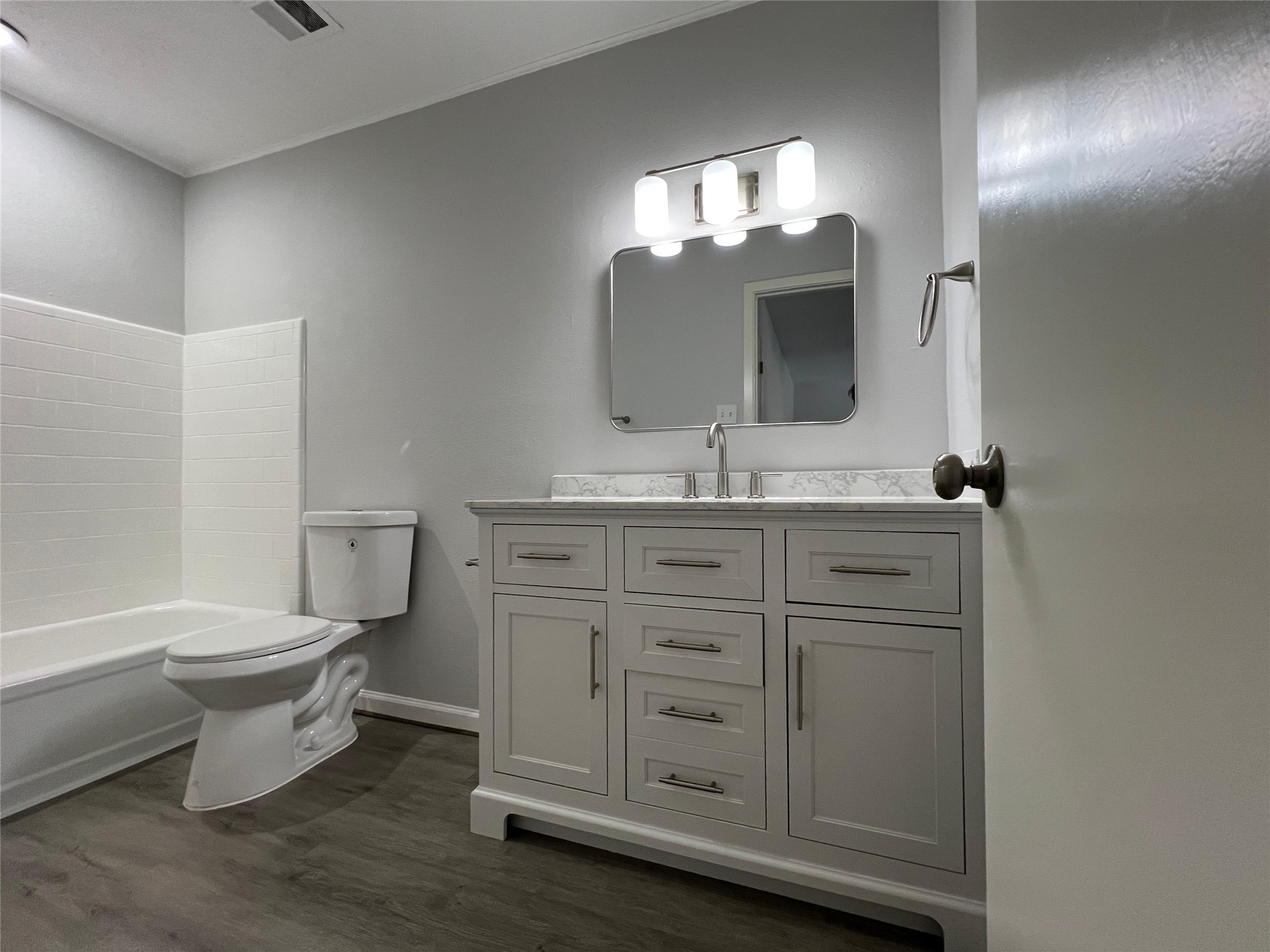 7012 Jetty Lane Houston, TX 77072 - Photo 16 of 24 a bathroom with a toilet sink and mirror