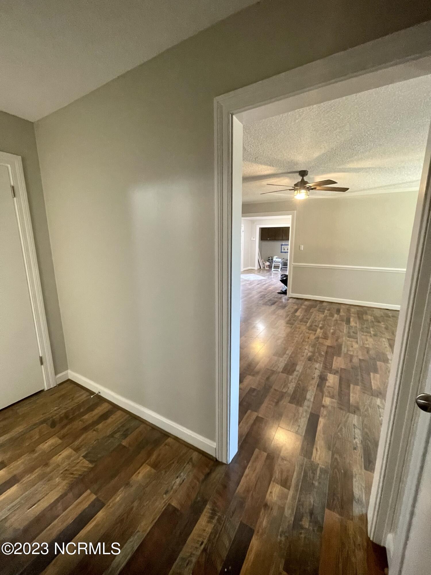 7627 High Road Sims, NC 27880 - Photo 20 of 26 Hallway to living area
