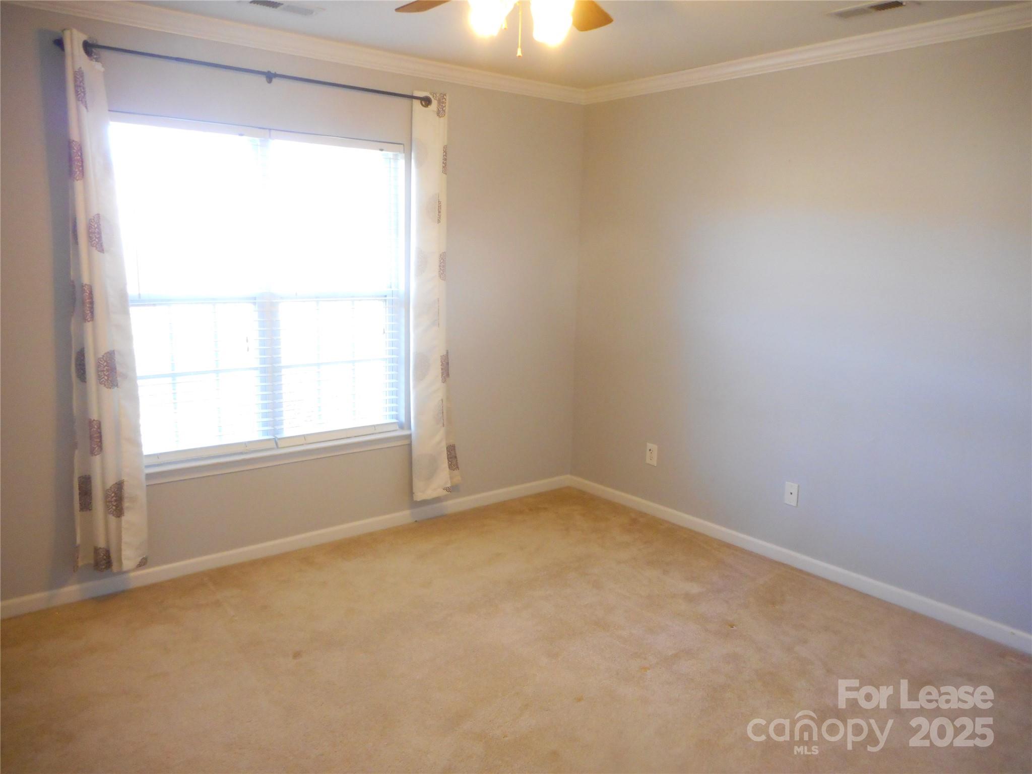 17207 Overstone Court Charlotte, NC 28277 - Photo 22 of 28 an empty room with a window