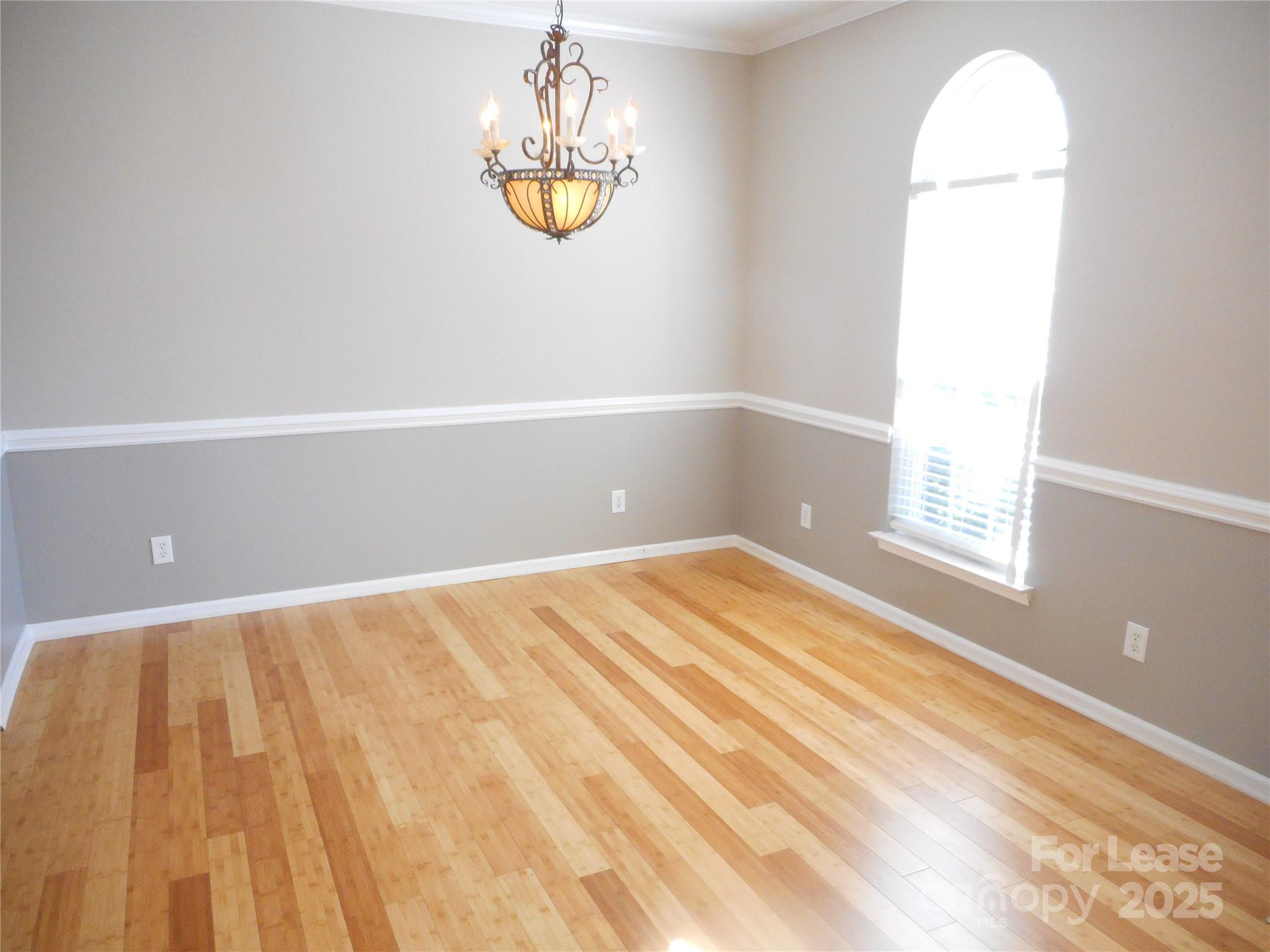 17207 Overstone Court Charlotte, NC 28277 - Photo 7 of 28 a view of an empty room and a window
