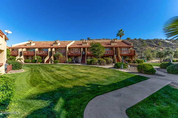 a view of a house with a big yard