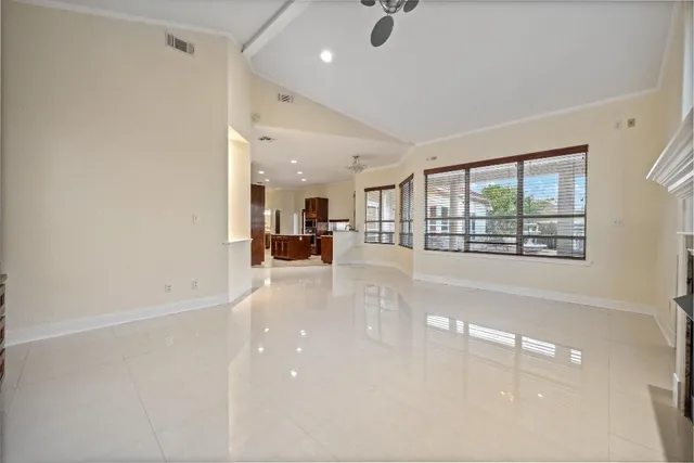 a kitchen with stainless steel appliances granite countertop a stove a sink dishwasher a refrigerator and a oven