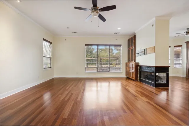 a view of kitchen with furniture and wooden floor