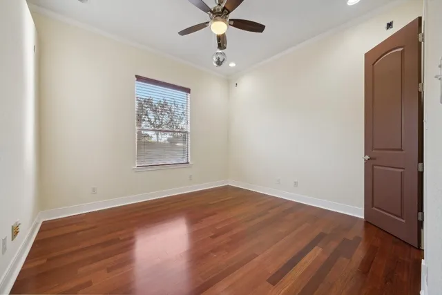 a view of a refrigerator and cabinets