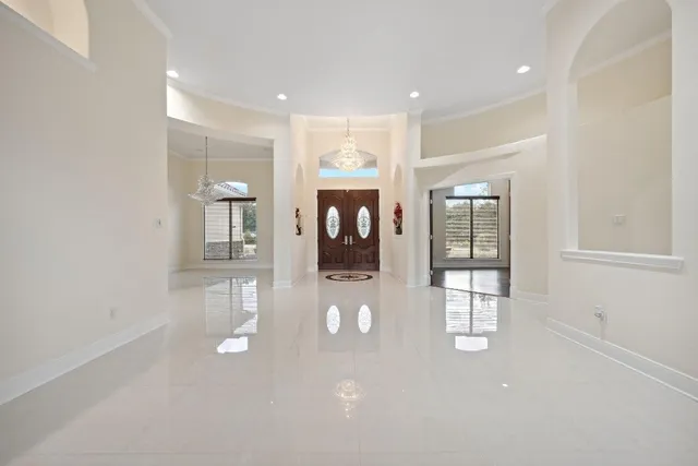 a view of livingroom and hardwood floor