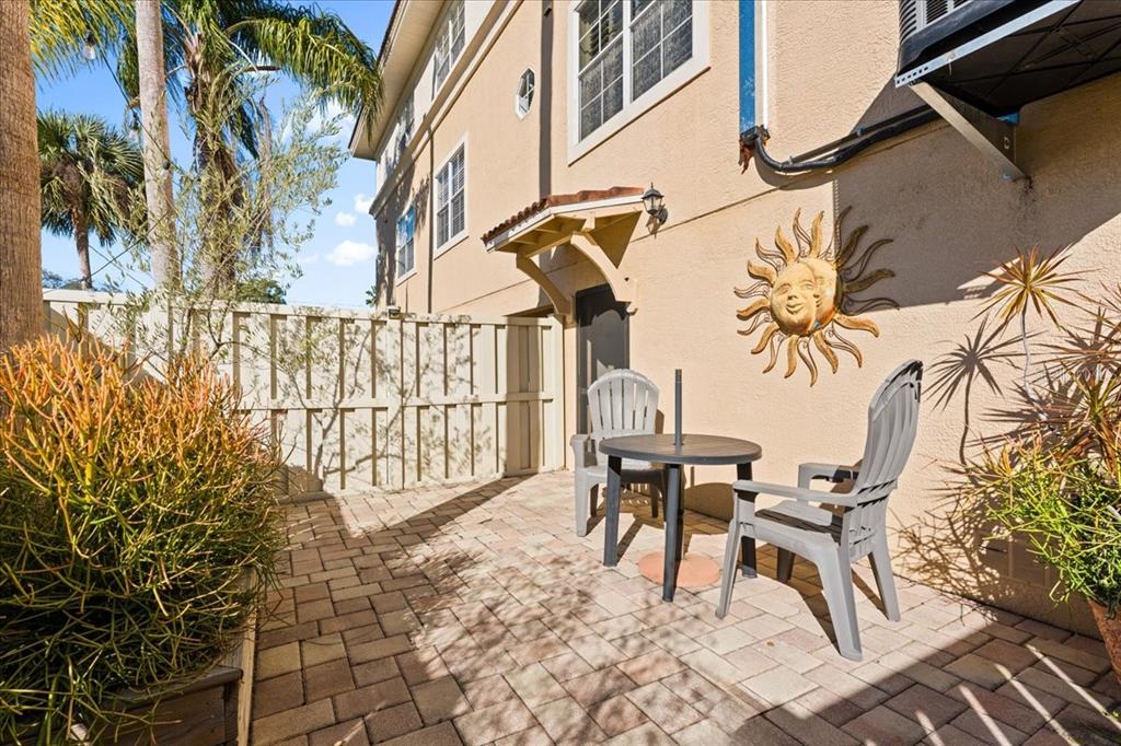 5627 Red Snapper Court New Port Richey, FL 34652 - Photo 11 of 54 a view of a chairs and table in patio