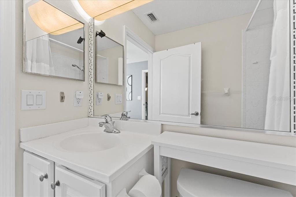 5627 Red Snapper Court New Port Richey, FL 34652 - Photo 34 of 54 a bathroom with a sink and a mirror