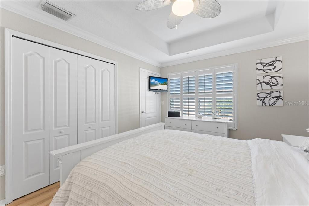 5627 Red Snapper Court New Port Richey, FL 34652 - Photo 36 of 54 a bedroom with a bed and a window