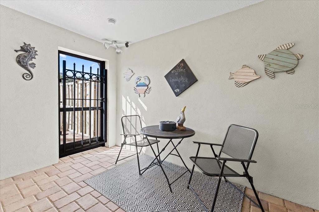 5627 Red Snapper Court New Port Richey, FL 34652 - Photo 5 of 54 a view of a workspace with furniture and wooden floor