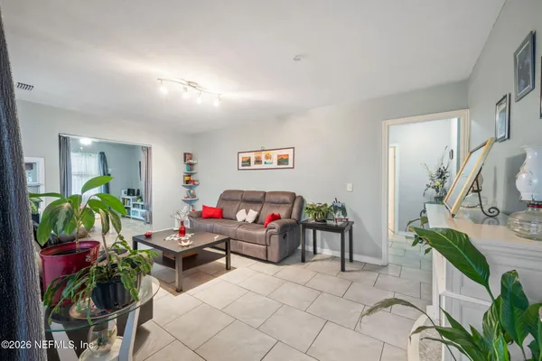 a living room with furniture and a couch