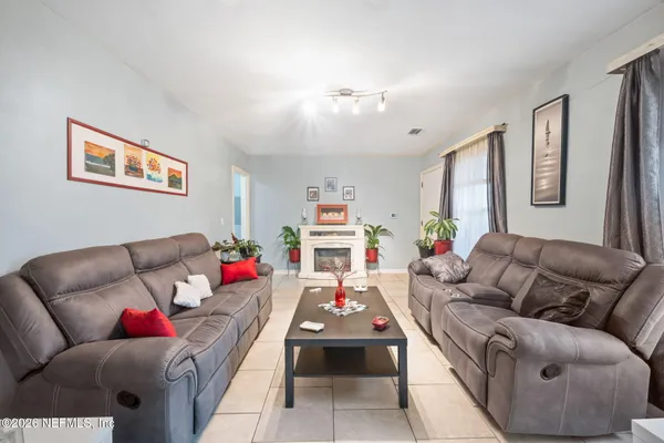 a living room with furniture and a couch