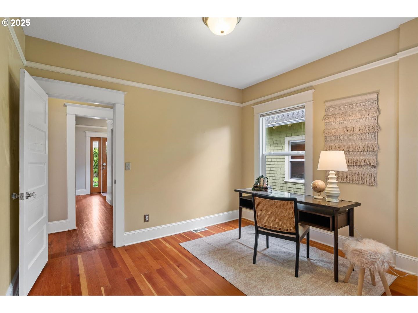 1626 Southeast 35th Avenue Portland, OR 97214 - Photo 15 of 40 a workspace with furniture and wooden floor