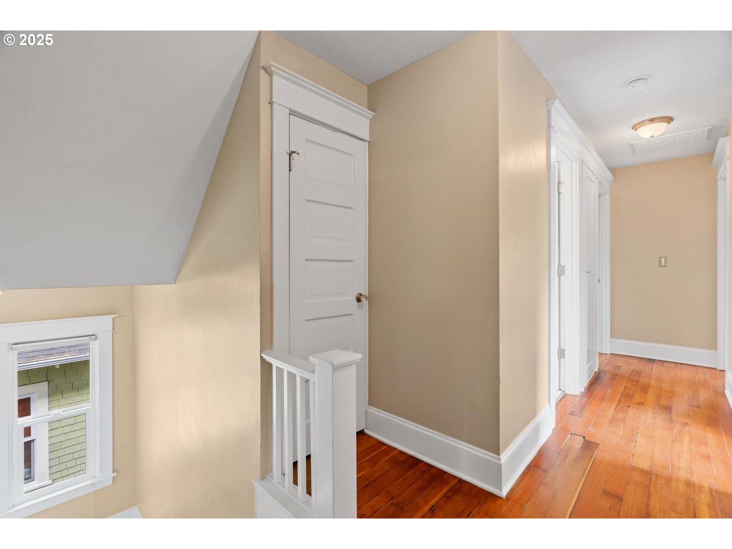 1626 Southeast 35th Avenue Portland, OR 97214 - Photo 18 of 40 a view of hallway with wooden floor