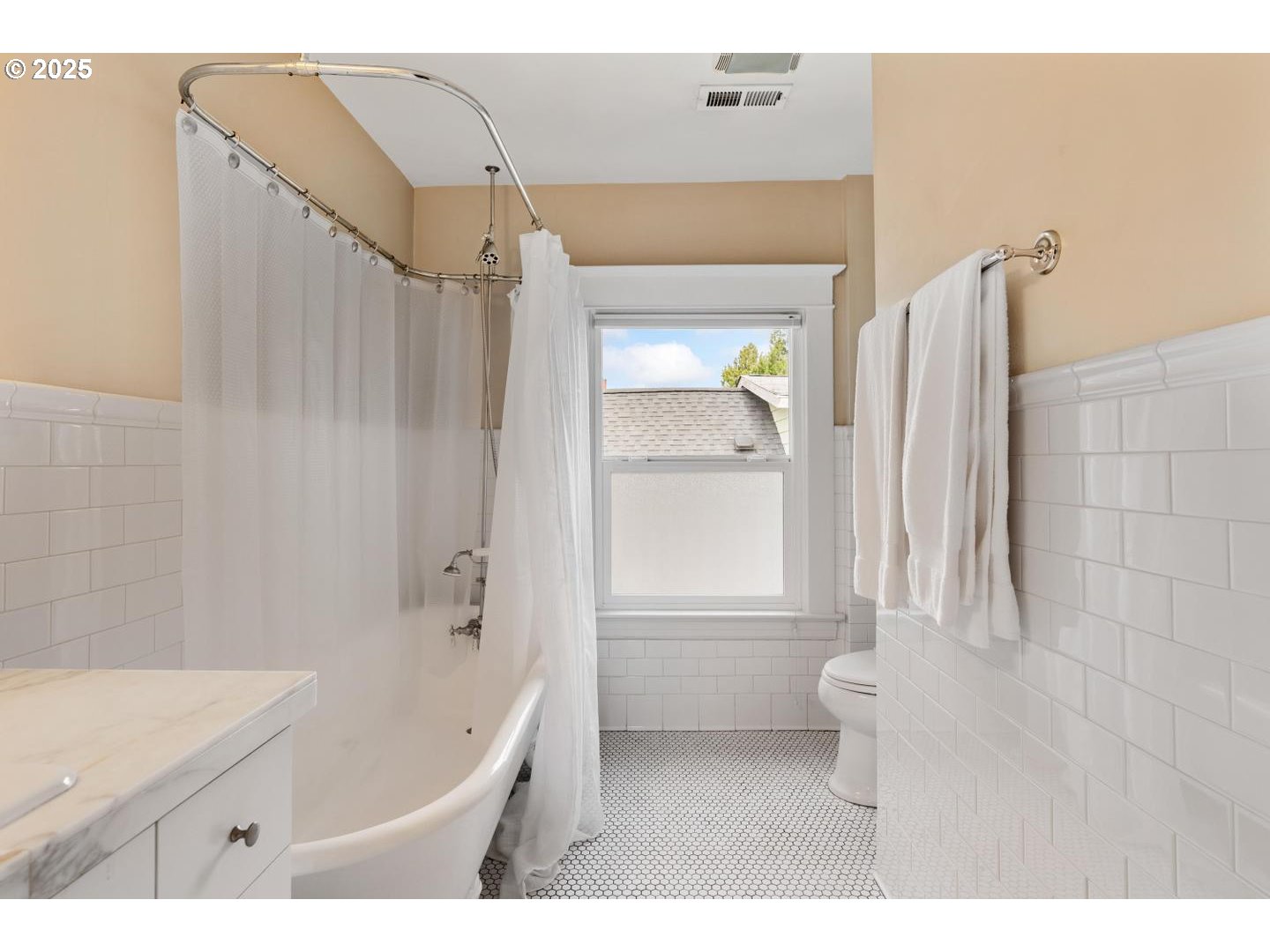 1626 Southeast 35th Avenue Portland, OR 97214 - Photo 31 of 40 a bathroom with a bathtub a sink and a shower