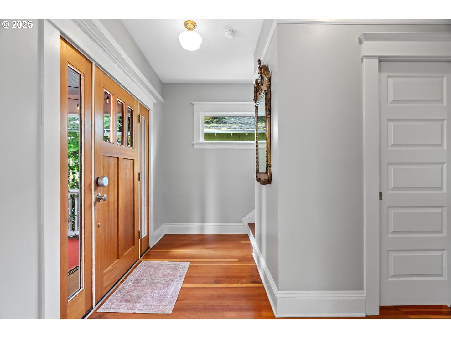 1626 Southeast 35th Avenue Portland, OR 97214 - Photo 5 of 40 a view of hallway with wooden floor