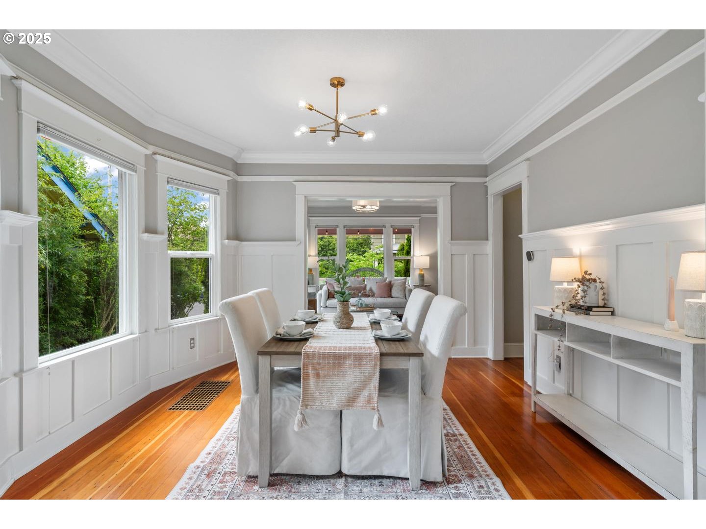 1626 Southeast 35th Avenue Portland, OR 97214 - Photo 9 of 40 a dining room with furniture a chandelier and wooden floor