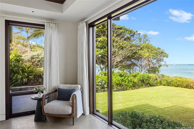 a living room with garden area and natural light
