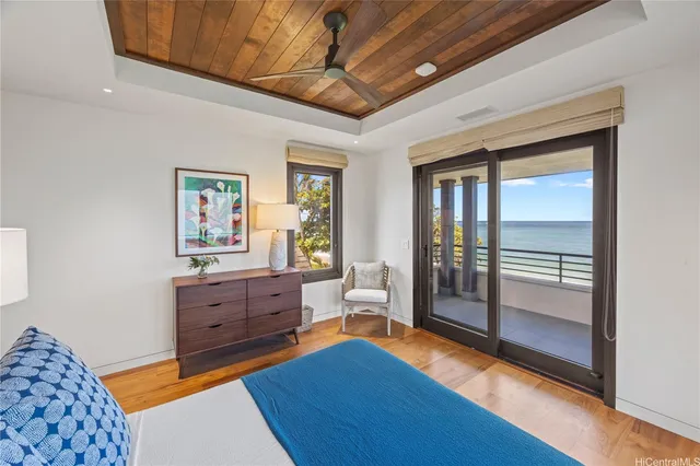 a bed room with a bed and a window