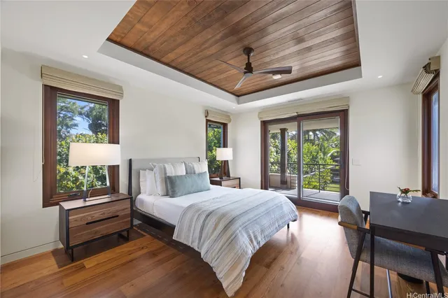 a bedroom with a bed and a table