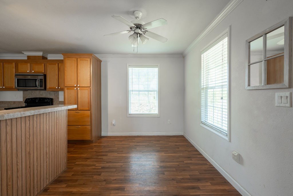 635 8th Street Dickinson, TX 77539 - Photo 4 of 12 a view of kitchen and windows