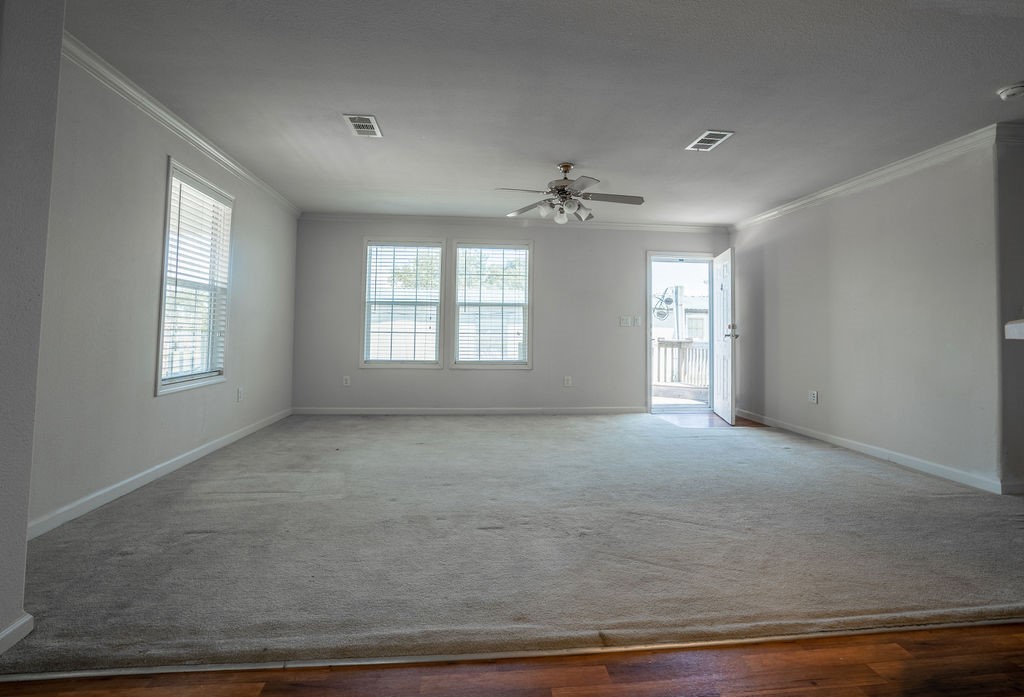 635 8th Street Dickinson, TX 77539 - Photo 6 of 12 a view of an empty room with a window