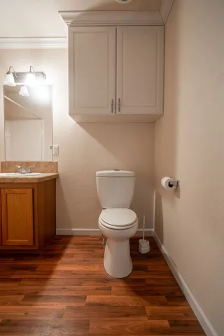 a bathroom with a toilet and a sink