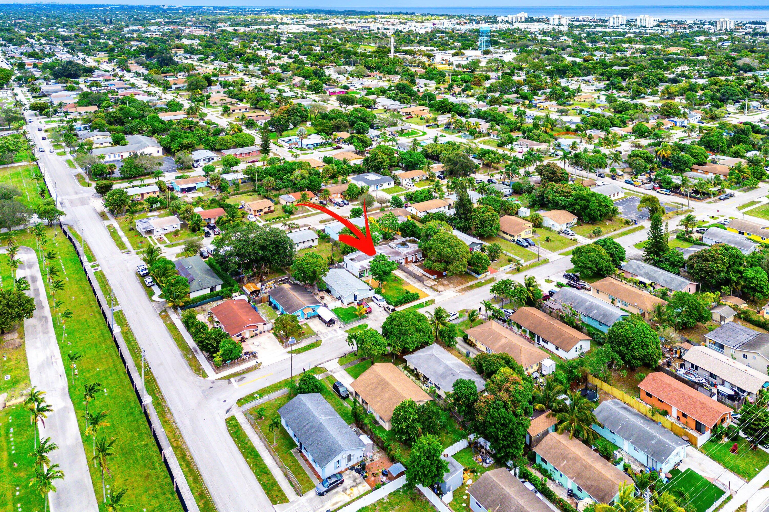 709 Southwest 9th Court Delray Beach, FL 33444 - Photo 32 of 32 an aerial view of residential houses with outdoor space and street view