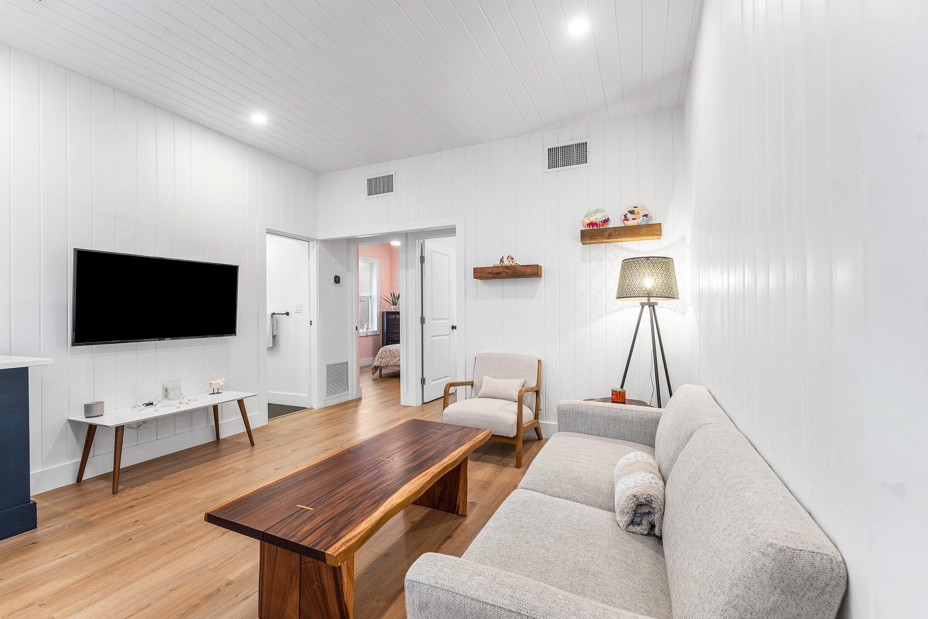 709 Southwest 9th Court Delray Beach, FL 33444 - Photo 5 of 32 a living room with furniture and a flat screen tv