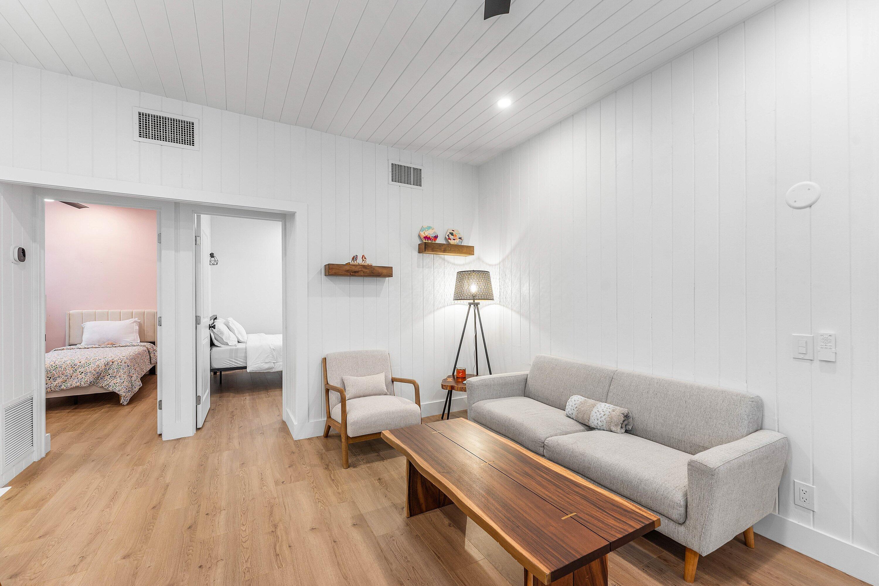 709 Southwest 9th Court Delray Beach, FL 33444 - Photo 6 of 32 a living room with furniture and a wooden floor
