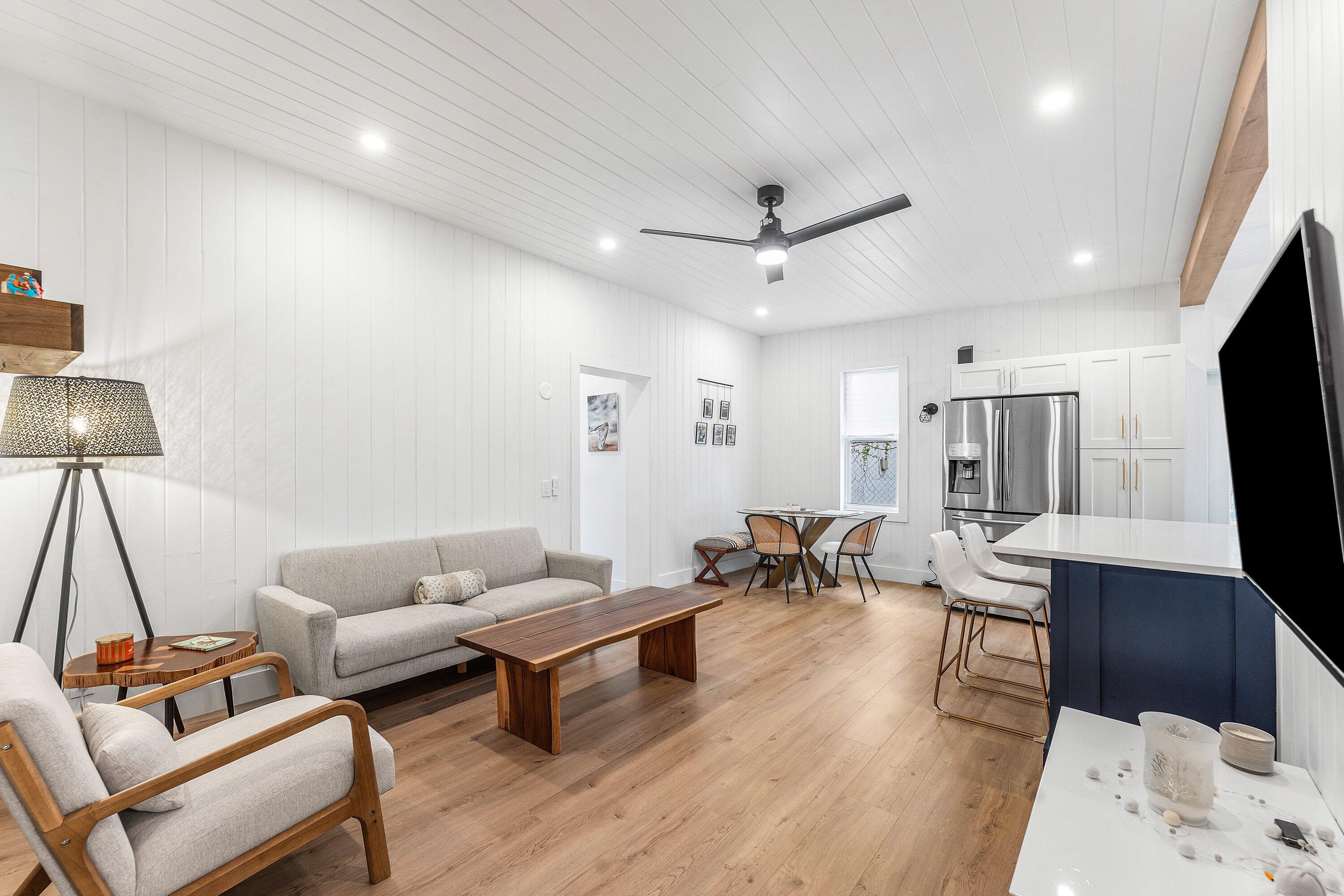 709 Southwest 9th Court Delray Beach, FL 33444 - Photo 7 of 32 a living room with furniture and a flat screen tv