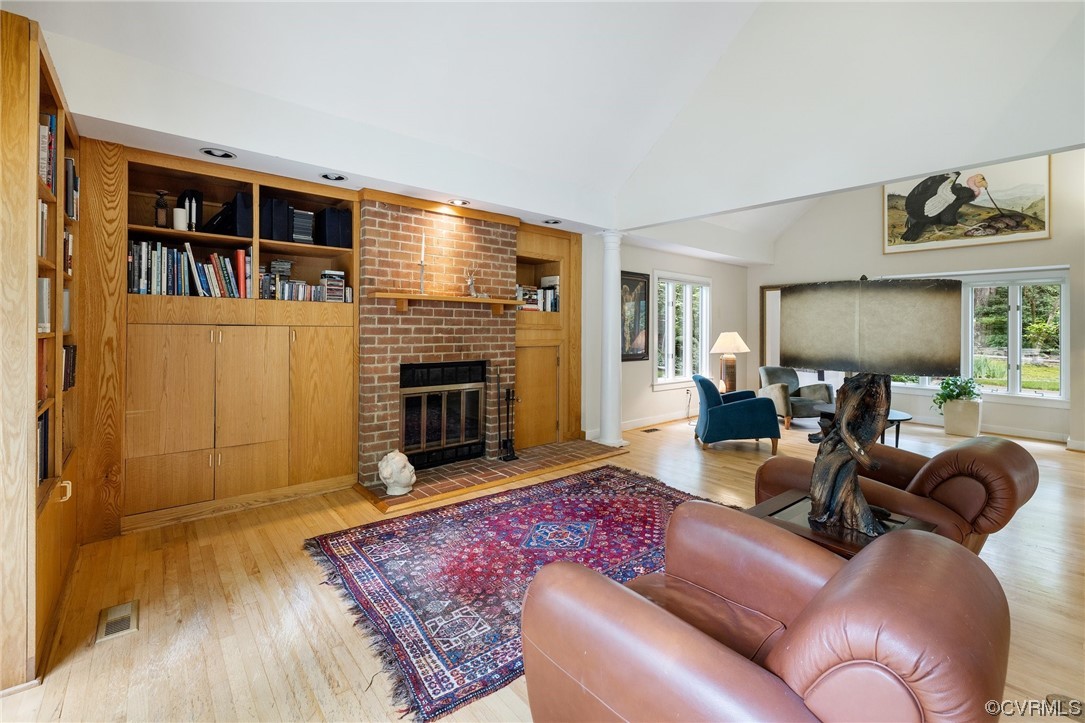 4516 Shirley Road Richmond, VA 23225 - Photo 9 of 33 Wood-burning fireplace. Built-ins. Vaulted ceiling.