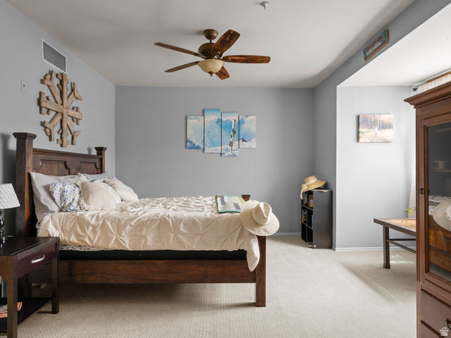 900 Bitner Road, Unit D 34 Park City, UT 84098 - Photo 20 of 25 Bedroom featuring light colored carpet and a ceiling fan
