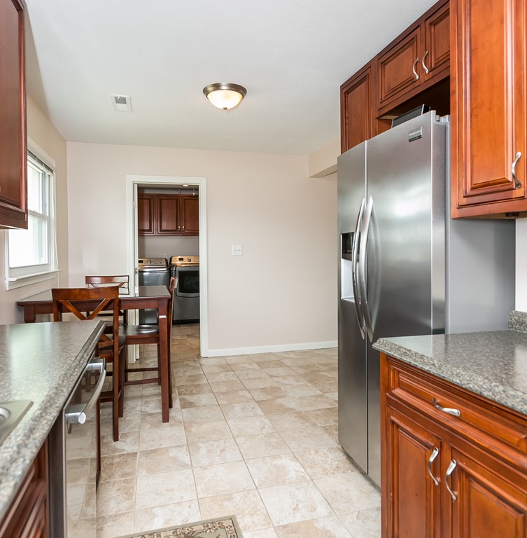 32 Old Farm Road Springfield, MA 01119 - Photo 18 of 27 a kitchen with stainless steel appliances granite countertop a refrigerator and a stove
