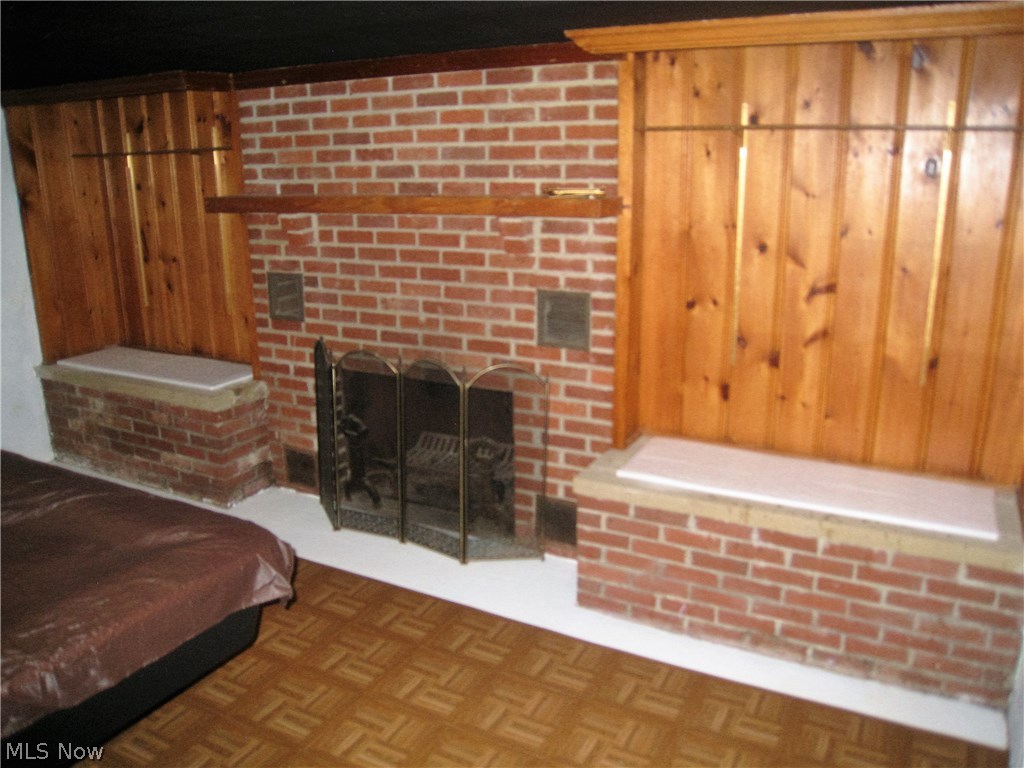 646 Rice Street Elmore, OH 43416 - Photo 14 of 20 Rec room includes a woodburning fireplace.