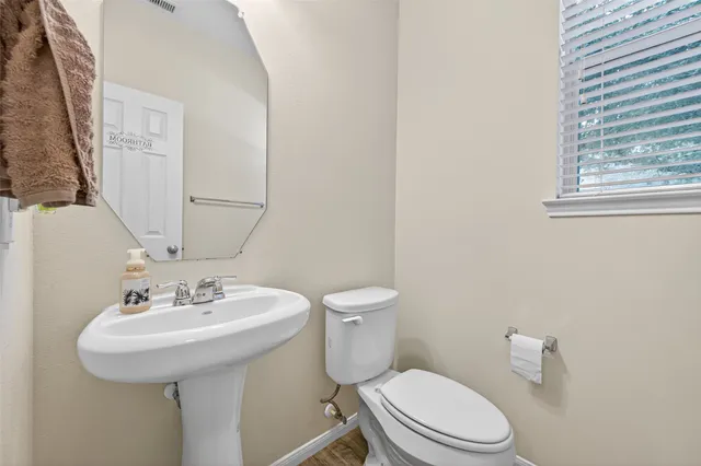 a view of a storage & utility room with dryer and washer