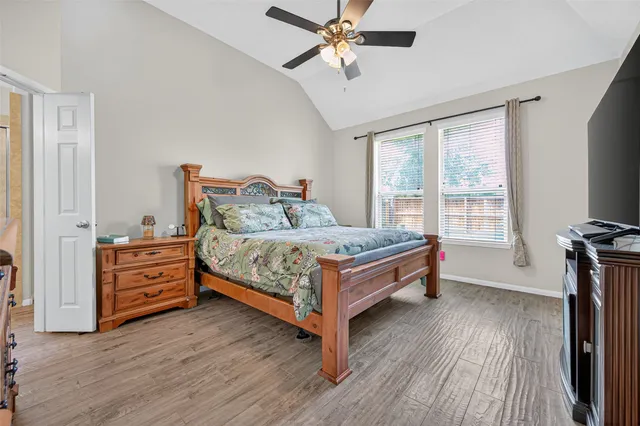 a bedroom with a bed and furniture